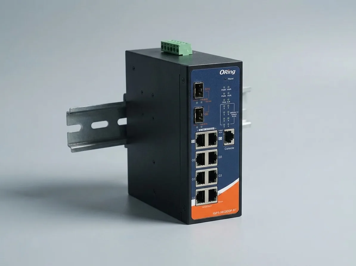Industrial Ethernet switch with RJ45 and SFP ports mounted on a DIN rail